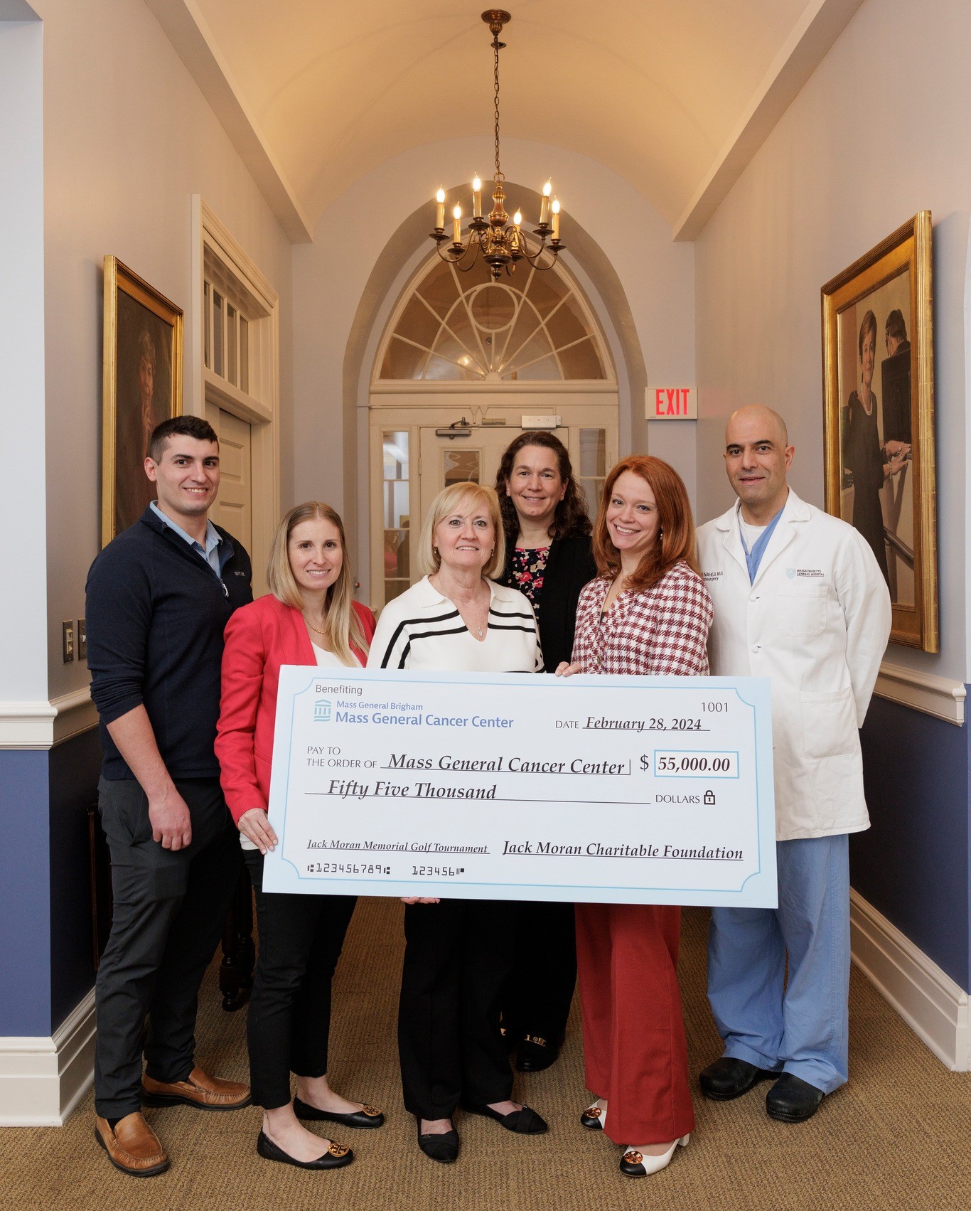 Moran Family with MGH team and check for $55,000