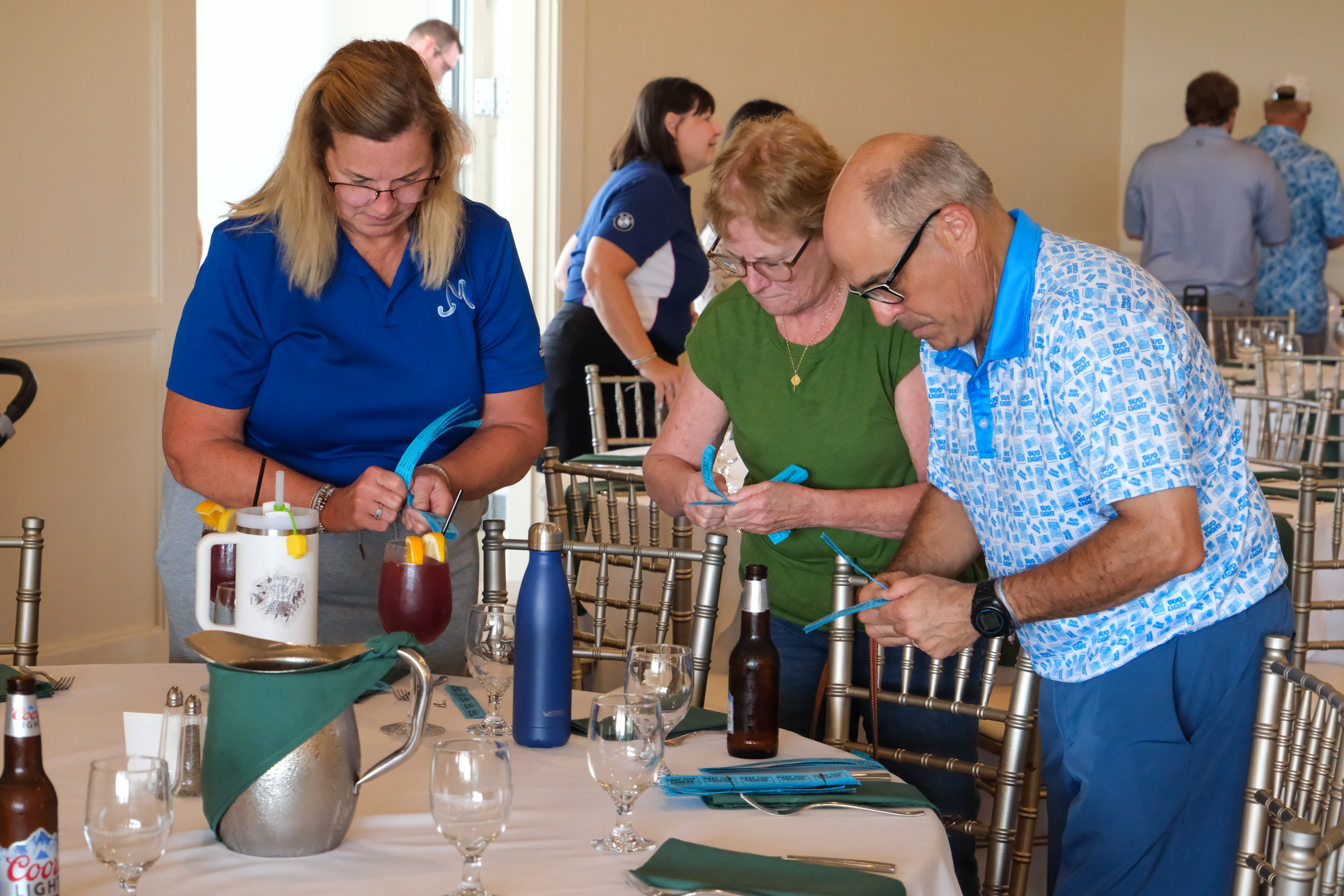 people with raffle tickets