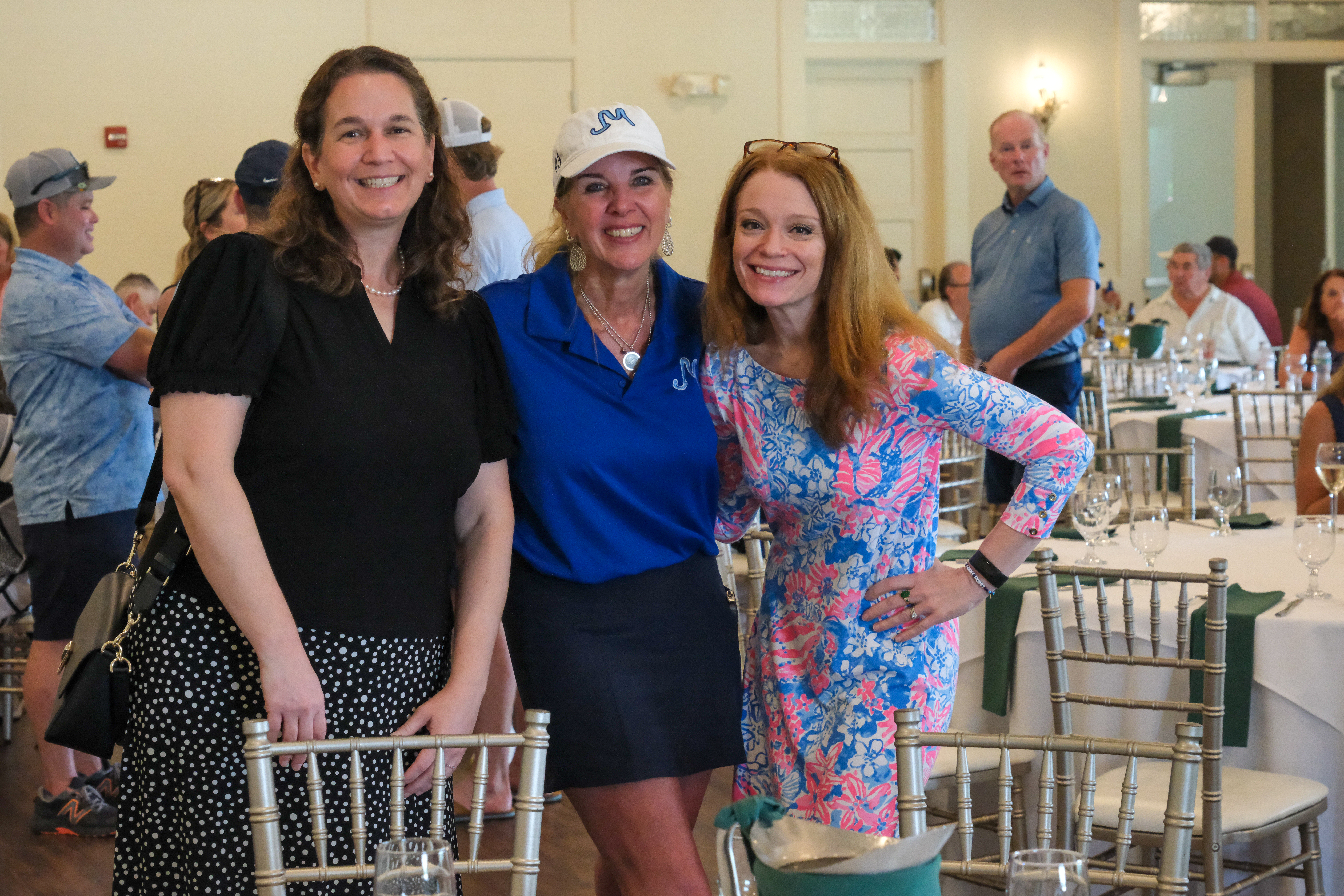 golfers smiling at camera